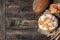 Bread border on wood background with copy space. Different kinds of bread in a corner. Bakery, cooking and grocery store