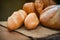 Bread and buns assortment / Fresh Bakery bread various types on sack in the rustic table homemade breakfast food