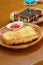 Bread, butter and strawberry jam - bread topped with chocolate.