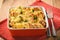 Bread casserole with chicken, spinach,eggs and cheese known as strata.