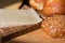 Bread and cheese closeup on wooden breakfast table