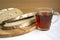 Bread and a cup of tea. Slices of bread and a glass of strong tea close-up. Fresh aromatic rye bread, cut into pieces