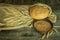 Bread with ears and wheat grain on a rough cloth