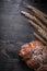 Bread golden wheat and rye ears on wooden board