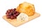 Bread grapes and blue cheese on a wooden board