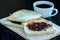 Bread with jam on wooden backgrond and hot americano, Black coffee