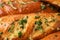 Bread loaves with garlic and herbs, closeup