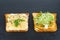 Bread pieces with delicious cod caviar, grilled mushrooms and sprouted alfalfa on black stone slate background