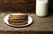 Bread placed on a wooden slope in the background