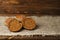 Bread placed on a wooden slope in the background