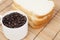 Bread plate and cup with coffee beans.