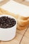 Bread plate and cup with coffee beans.