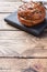 Bread products with cereals and seeds on a wooden background. Lean healthy buns, carbohydrate pastries. Copy space