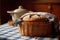 bread proofing in a linen-lined basket