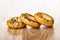 Bread rings sushka with poppy seeds on wooden table