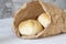Bread roll buns in a brown paper bag. Eco friendly disposable sustainable packaging