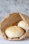 Bread roll buns in a brown paper bag. Eco friendly disposable sustainable packaging