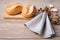 Bread rolls, linen napkin and Christmas decorations