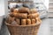 Bread rolls in a wicker basket, a bakery in a supermarket