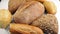 Bread in the rotating basket on a table. Loop