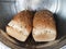 Bread sandwich whole wheat and seeds in bakery center america, fresh, organic product of the day.