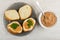Bread, sandwiches with pollock caviar, parsley in plate in bowl with pollock caviar on table. Top view