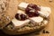 Bread served with camembert and cranberry