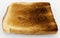 Bread slice - single baked toast close-up - isolated on white