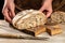 Bread, traditional sourdough bread cut into slices. Bakery, food concept. Top view