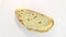 Bread  white, cut piece, rotation, turning counterclockwise, on white background, top macro view.