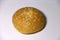 Bread with white sesame seeds on white background. it is a food made of flour, water, and yeast .