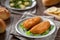 Breaded Fish Fillet With Salad. High quality photo.