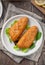 Breaded Fish Fillet With Salad. High quality photo.