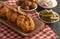 Breaded and Fried Jumbo Shrimp with Tails on a Wooden Table