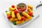 Breaded mozzarella cheese sticks with tomato basil sauce