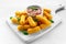 Breaded mozzarella cheese sticks with tomato basil sauce