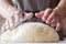 Breadmaking food culinary man hands knead dough