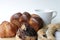 Breads and a Cup of Coffee on White Background