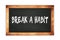 BREAK  A  HABIT text written on wooden frame school blackboard