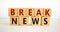 Break news time. Wooden blocks with words `break news`. Beautiful white background. Business and break news concept. Copy space