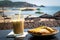 Breakfast on the beach. A sandwich and a coffee cocktail on the table in the restaurant on background of the sea