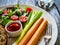 Breakfast - boiled sausages, bread and fresh vegetables served on wooden table