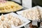 Breakfast buffet in hotel. A plate of meringue.