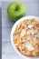 Breakfast cereal with diced and fresh apple