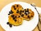 Breakfast for child. Delicious sweet pancakes with syrup, blueberries