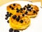 Breakfast for child. Delicious sweet pancakes with syrup, blueberries