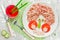 Breakfast for child. Pink noodles with sausage tomato cucumber a