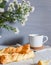 Breakfast coffee and bakery flowers morning rustic stilllife village light