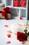 Breakfast coffee love heart red rose setting with white mug and gift box in Valentine`s day setting