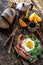 Breakfast with coffee pot fried egg and becon in rustic stile